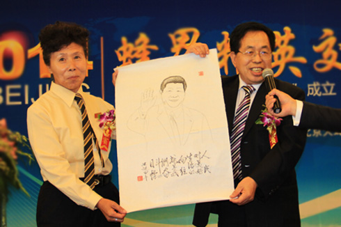 雷锋车队王凤进女士与著名书画家王迈合影